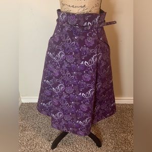 Purple and silver skirt.